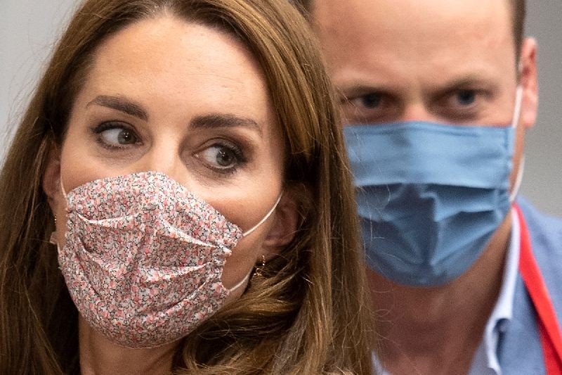 Britain's Prince William and Catherine, Duchess of Cambridge, wear face masks during a visit to Beigel Bake Brick Lane Bakery in East London, Britain on September 15, 2020. (Photo by Justin Tallis/Pool via Reuters)
